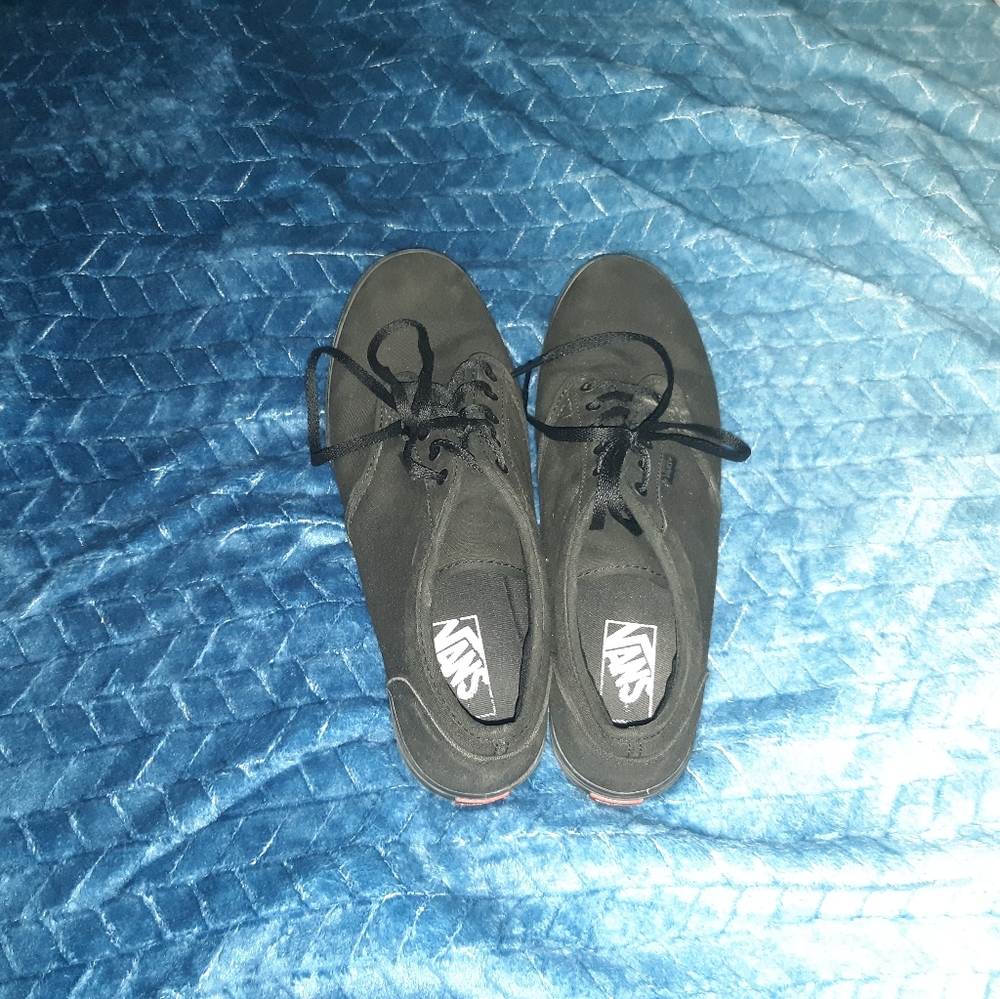 Black low top Vans